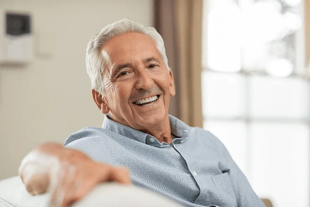 Smiling patient representing Emergency Dentistry at Crowley Dental
